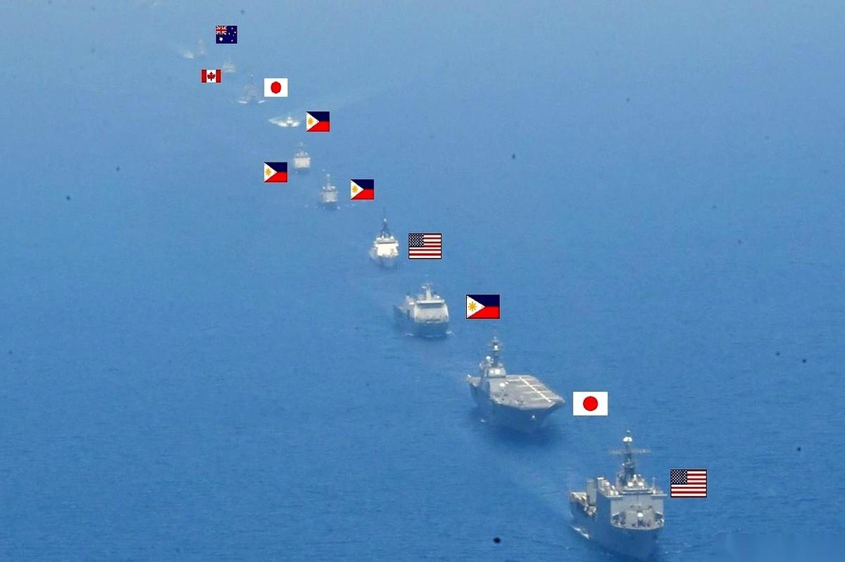 日本自卫队，发了张照片。地点，就在咱们家门口。照片里，美日菲三家凑在一起，一堆