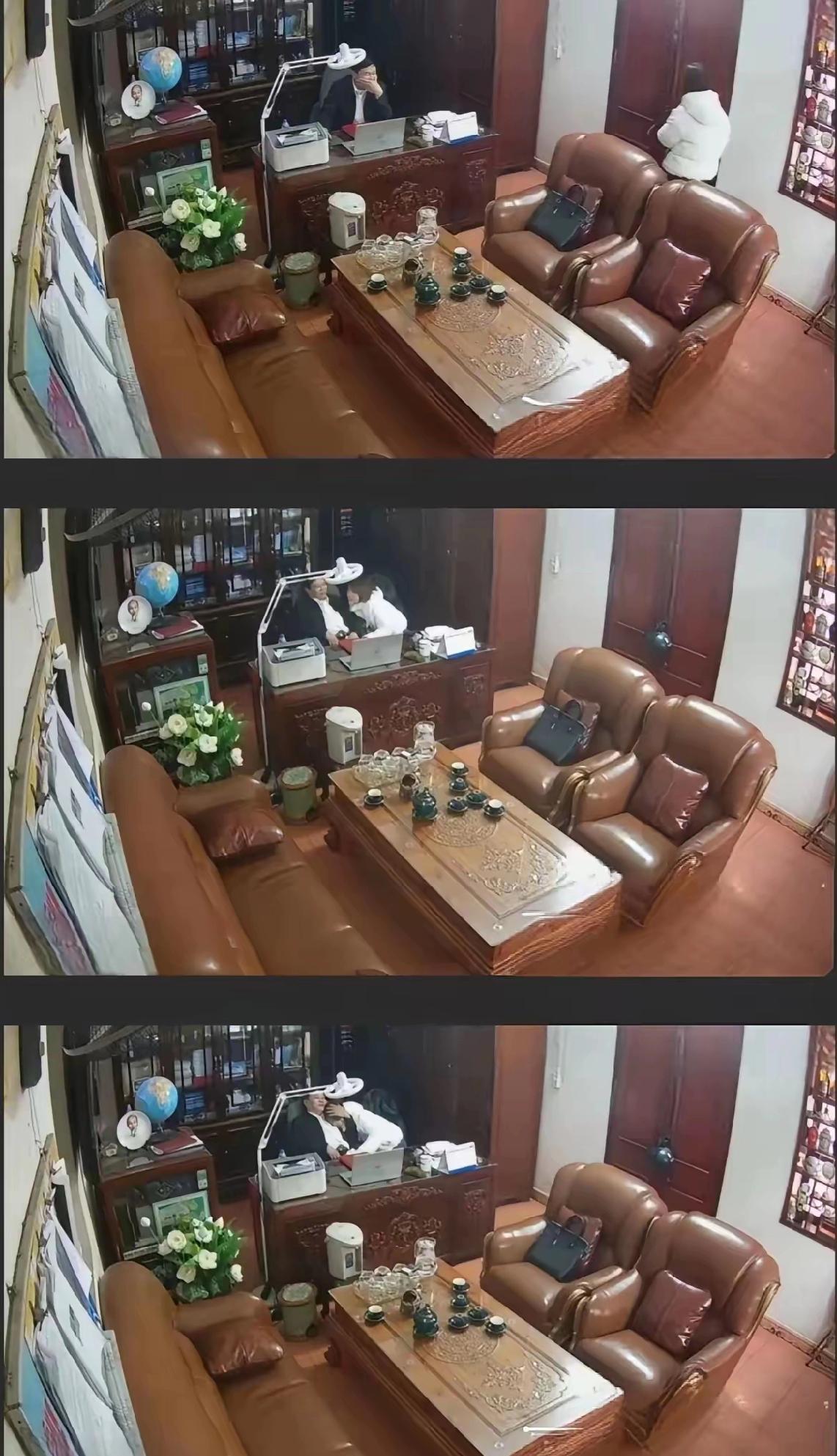 桌子上摆着胡志明相片，室内精准的被摄像头捕捉到人物动态，试问，这个摄像头谁安装的