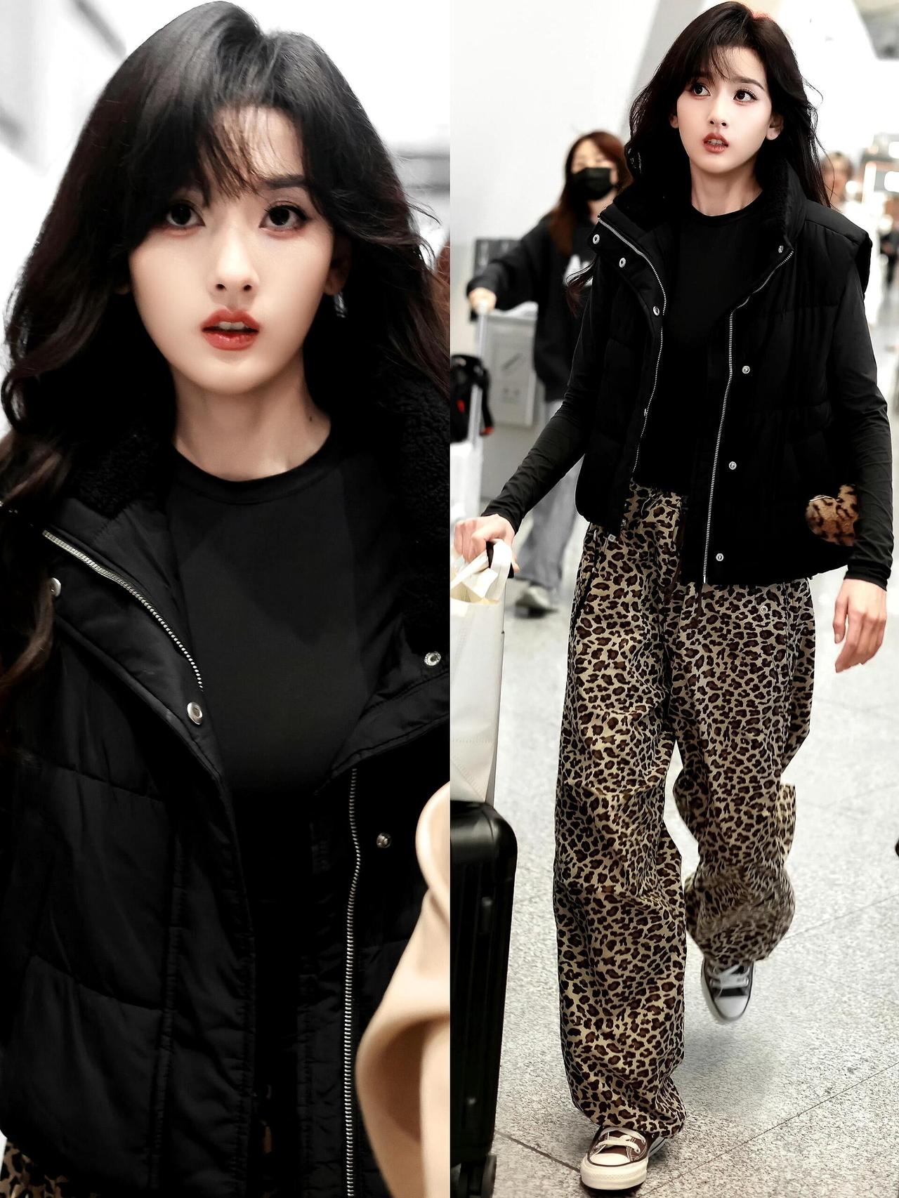 宋祖儿街拍，这次的港风很适合她！黑色马甲搭配紧身黑打底，又酷又保暖，豹纹阔腿裤