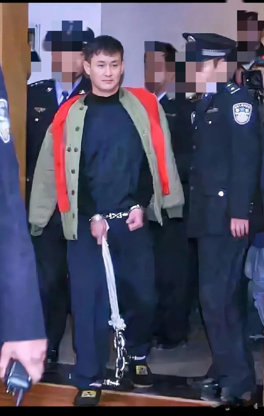 这个罪大恶极的犯罪分子名叫张显光，2006年伏法，从这个人的长相上看，真看不出是