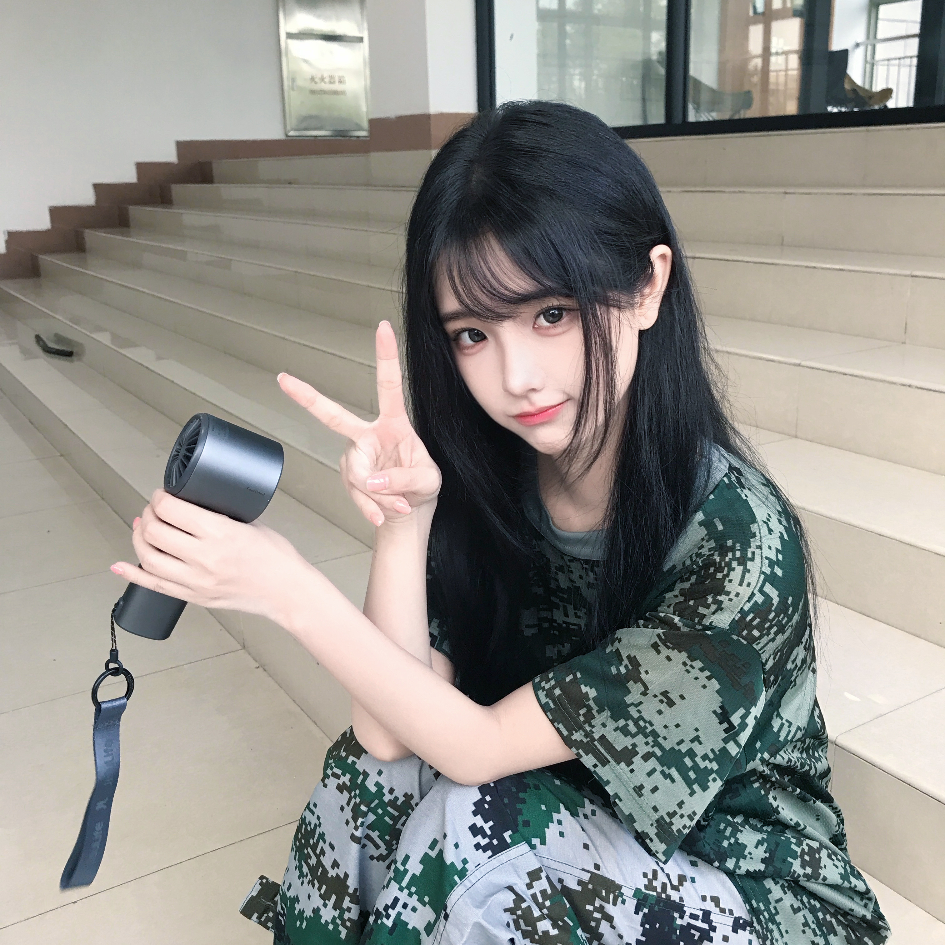 啦啦，拍照中