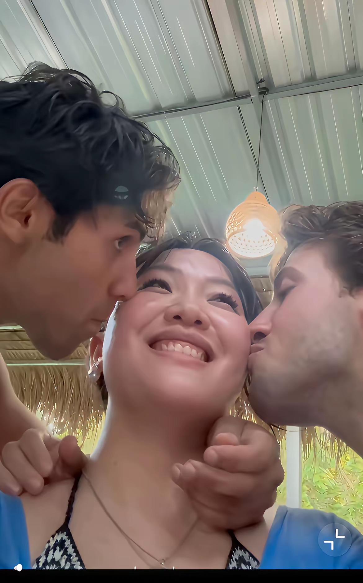 两个意大利男子赤着上身亲吻女子，这是欧洲常规贴面礼仪吗？搞笑的是，女生还主动
