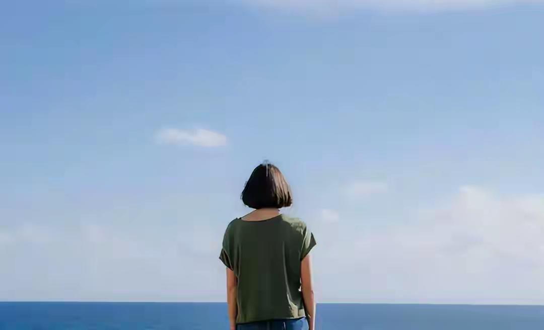 2013年的那个夜晚，南昌的冬雨下得很冷很冷。病床上，一个连眨眼睛都费力的女人，