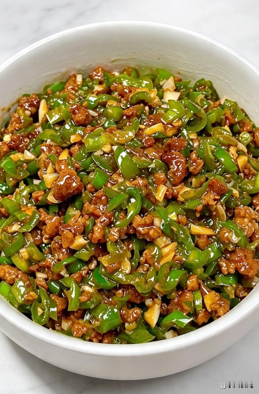 就这道青椒肉末，拌米饭我能多干两大碗。不知道你们有没有碰到过这种菜，去亲戚家吃一