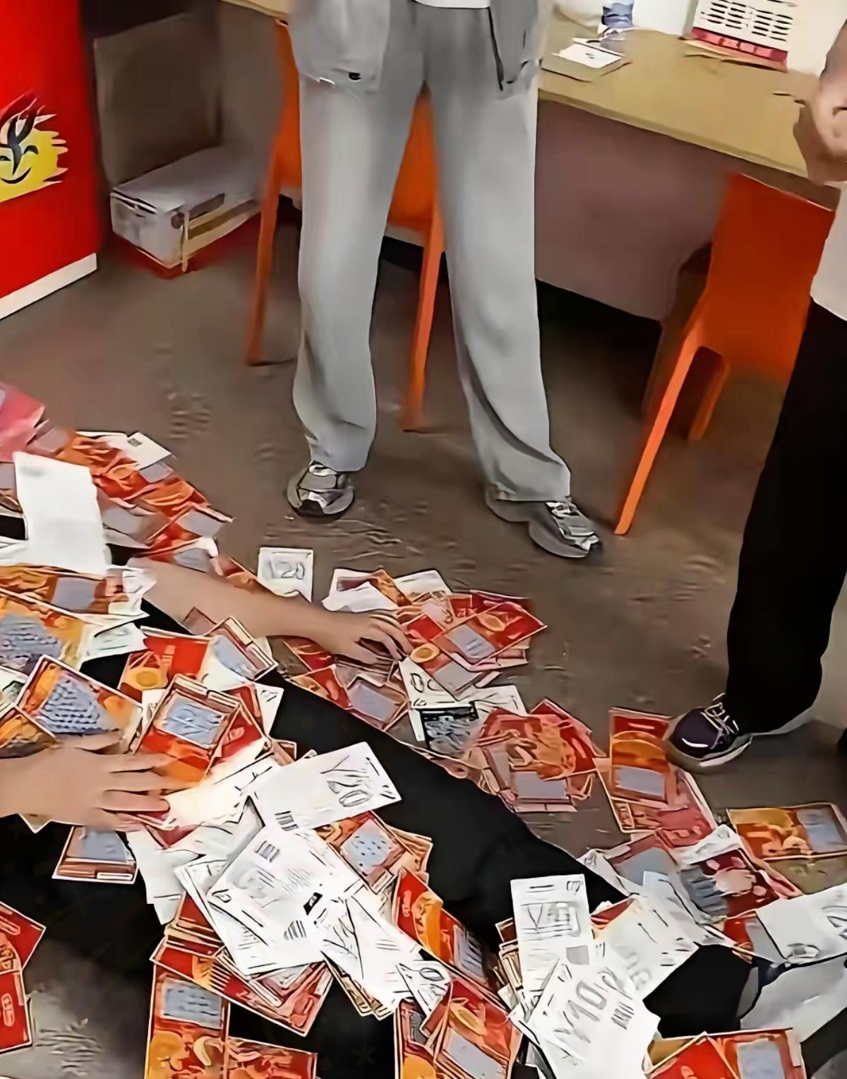 这大哥可真狠！砸21万多直接包圆彩票店刮刮乐，就为验证真实中奖率，最后刮出13