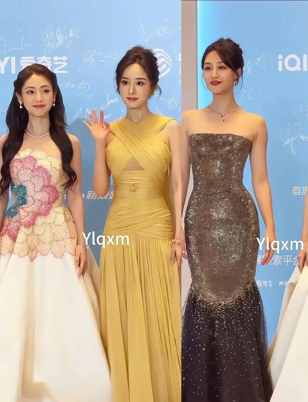 中间是漂亮的杨幂，左和右边的美女是谁？三位养眼。