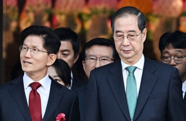 韩德洙希望与韩国大选候选人金文洙今天会晤，金文洙回应：没时间