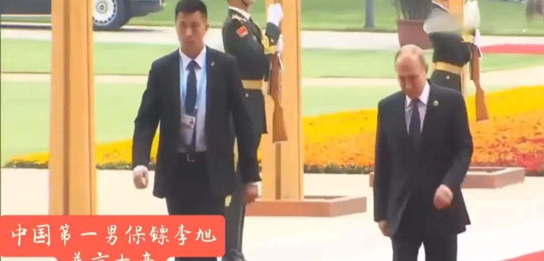 这是李旭工作时的几张图片！李旭外形俊朗，估计身高在190以上。小伙防范意识强