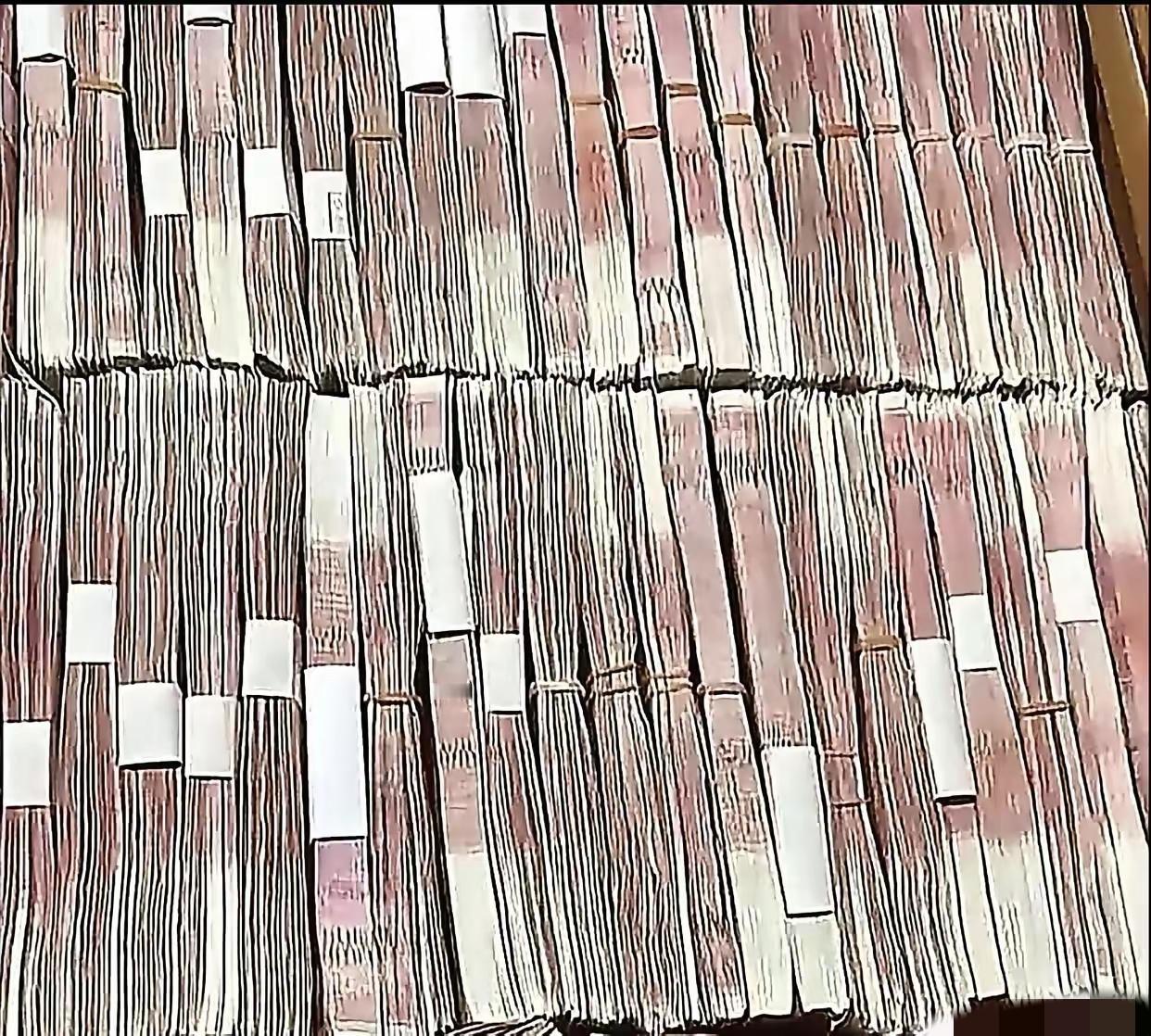 什么叫洗钱?你明天去买张彩票，中了五百万，按照国家法规要扣20%所得税，实际上