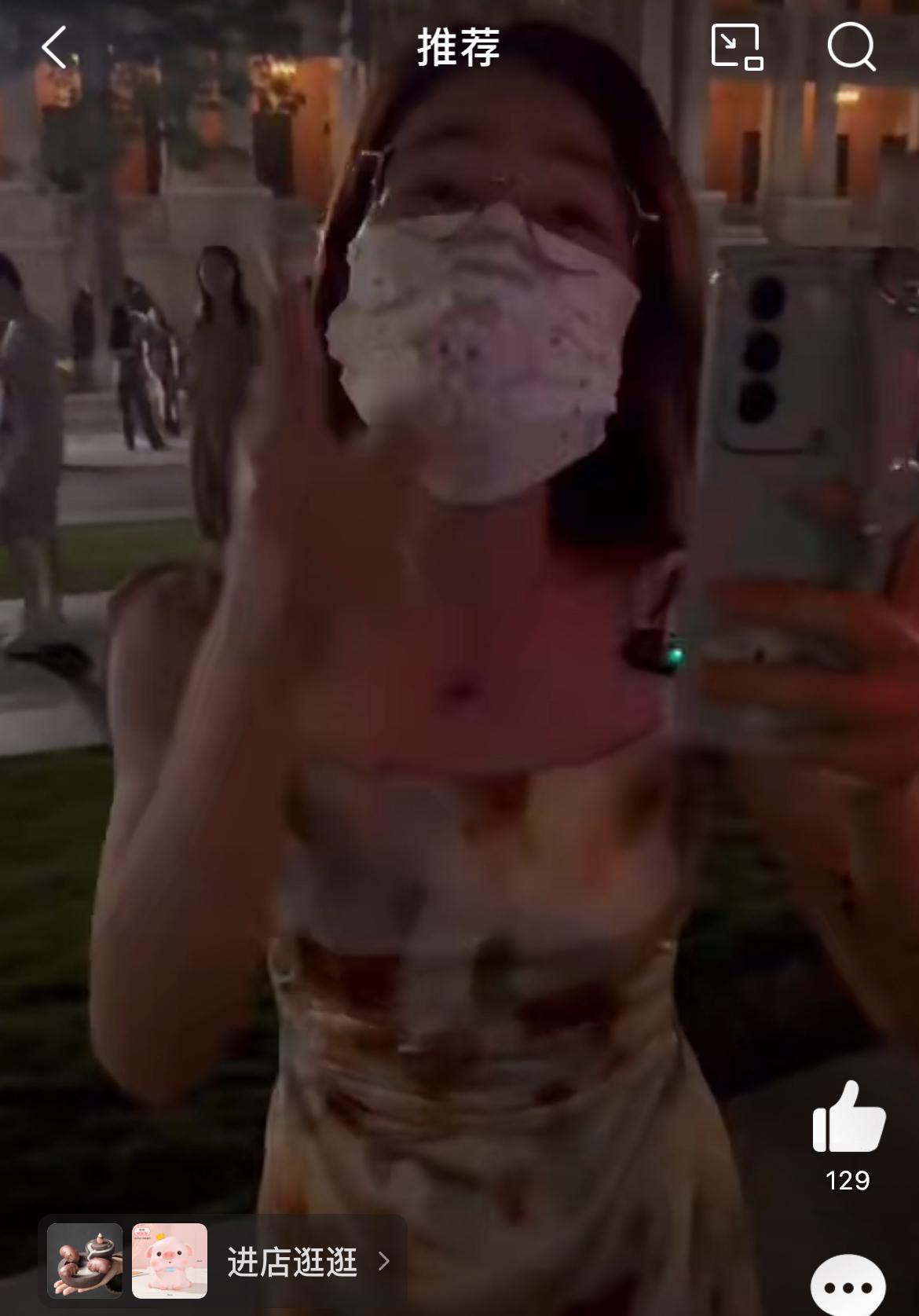 小仙女户外直播，旁边男的抽烟不能忍，直接水瓶砸人。事发广州海珠人民桥附近。话说户