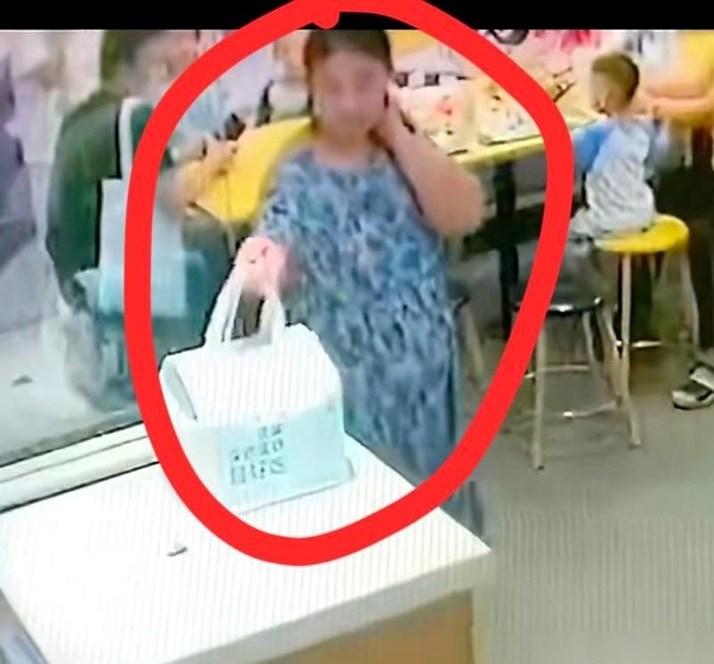 真不敢信。一个挺着大肚子的孕妇，嘴角还挂着没抹干净的白奶油，正被个急得满头大汗