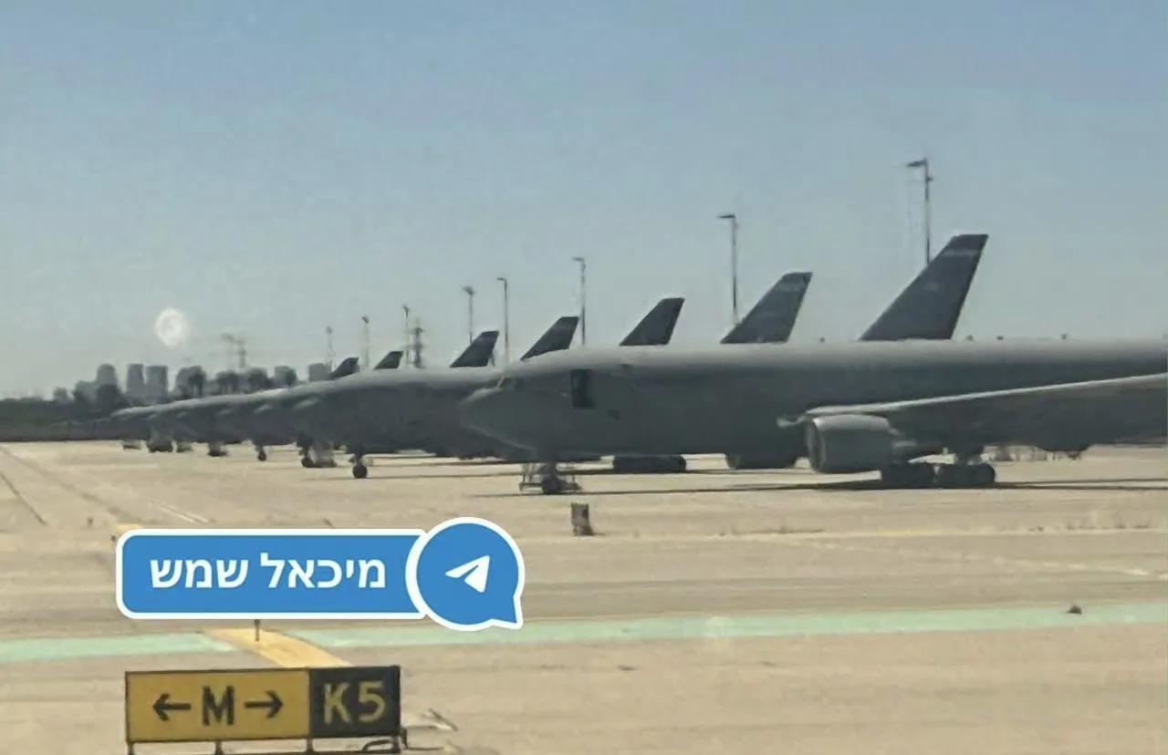 以色列本-古里安机场停着成排的美国空军加油机。战争的阴云一直没有从中东地区的上