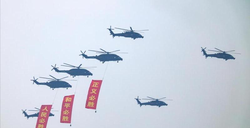 新加坡联合早报报道：“北京星期三（9月3日）举行的九三阅兵式上，出现了一组新口号