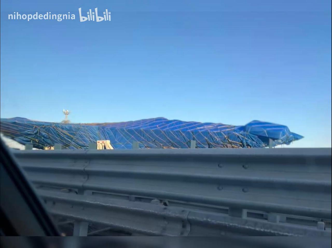 高速公路上又一次偶遇粽子机，包的严严实实，一看就是要去某地做整机力学试验。现在不