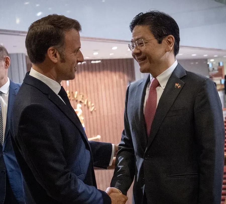 新加坡总理黄循财这是全面倒向西方国家了，新加坡组织的香会已经沦落了，成为法国总统