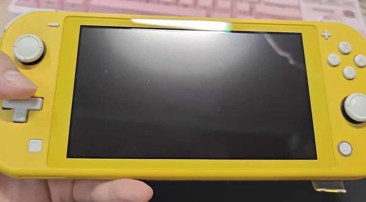 ➗二手黄色switchlite小黄状态如图加一张512G内存卡游戏账号不退可