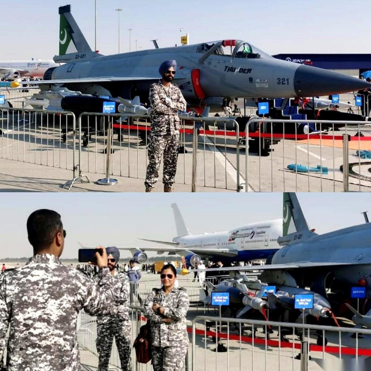 就这张照片，味儿太冲了。一个印度空军的哥们儿，正死死盯着巴基斯坦的枭龙战机。那