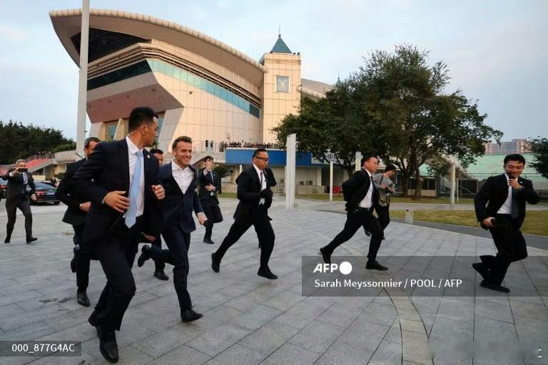 法新社图片，没加黑滤镜，差评，记住中国的好马克龙访华