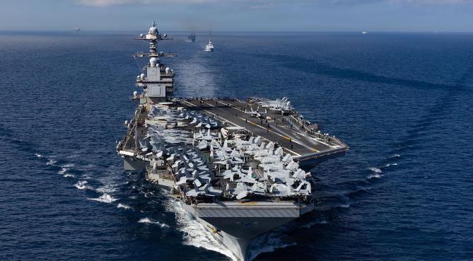 美军唯一电磁航母悍然出击，马杜罗动员20万大军迎战，当场击落的到底是什么硬茬？