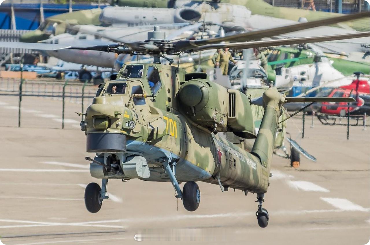 一架奇特的直升机，双发单旋翼设计，串列双座布局，跪式前起落架，机头下弹药箱外置的