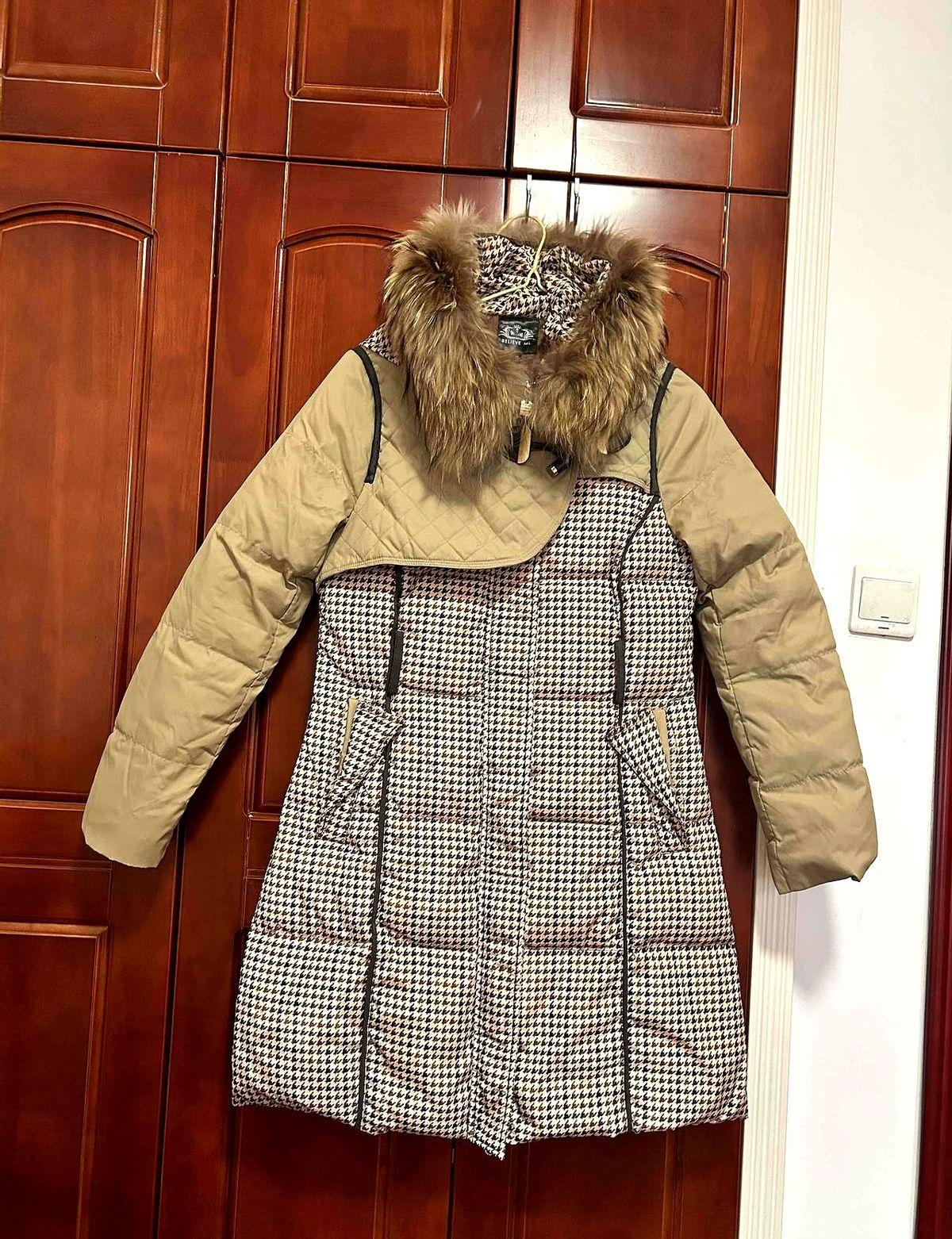 一件20年前花掉我一个月工资的羽绒服，差点被我扔了。直到上周，我在寒风里站了15