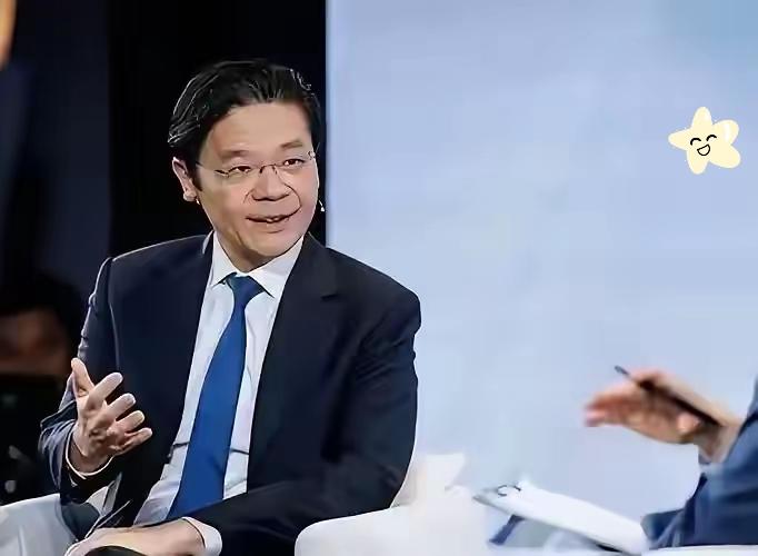 新加坡总理黄循财坐在加拿大电视台的聚光灯下，神情急切，语速紧凑，像急于递交一份“