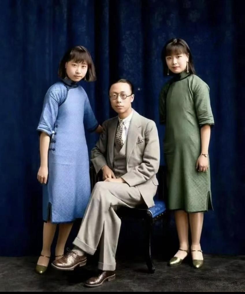 分享一张经典老照片溥仪虽无帝王之相，两个妹妹倒有龙凤之姿！