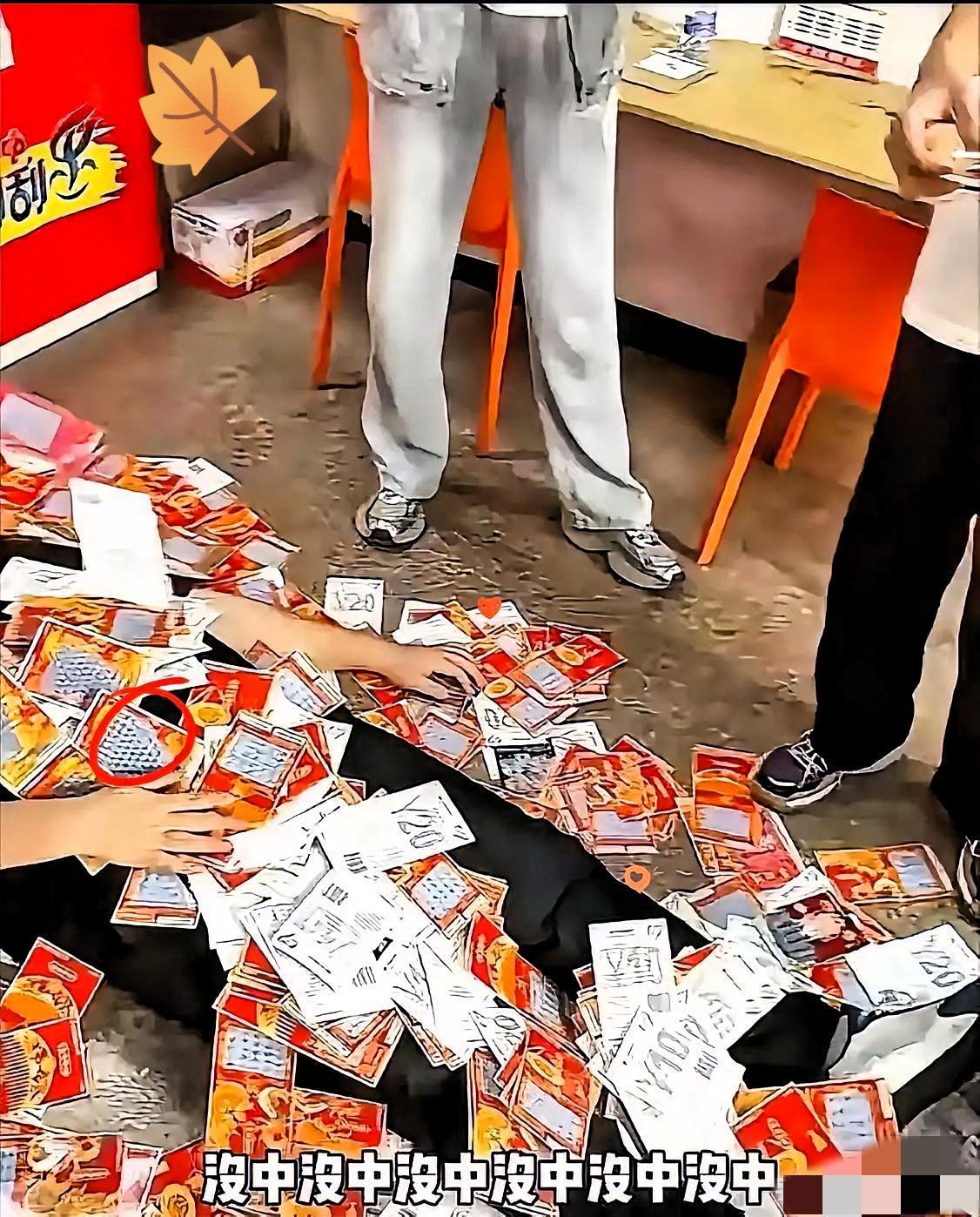 有个大哥是真敢冲直接豪掷21万1200块把彩票店的刮刮乐全包圆了一顿猛刮猛