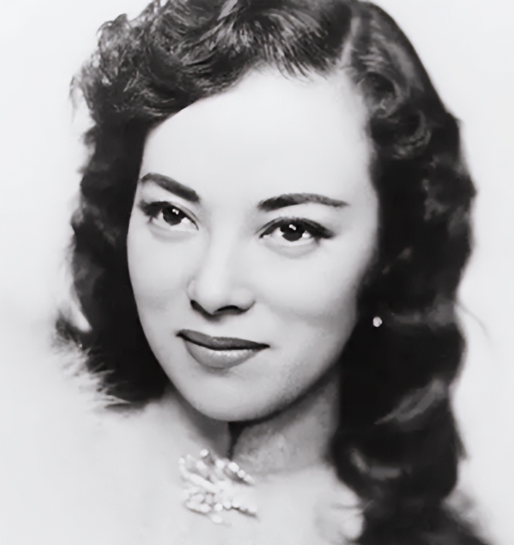 1945年，日本战败后，李香兰因汉奸罪被判处死刑。可是就在枪决前，她突然她突然伸