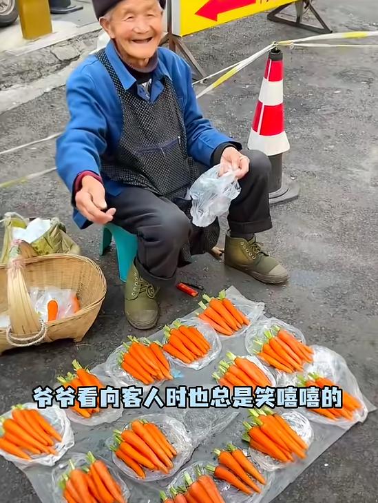 “太治愈了！”5月10日报道，贵州安顺，一爷爷去卖胡萝卜，虽然摊位简陋，但他会把