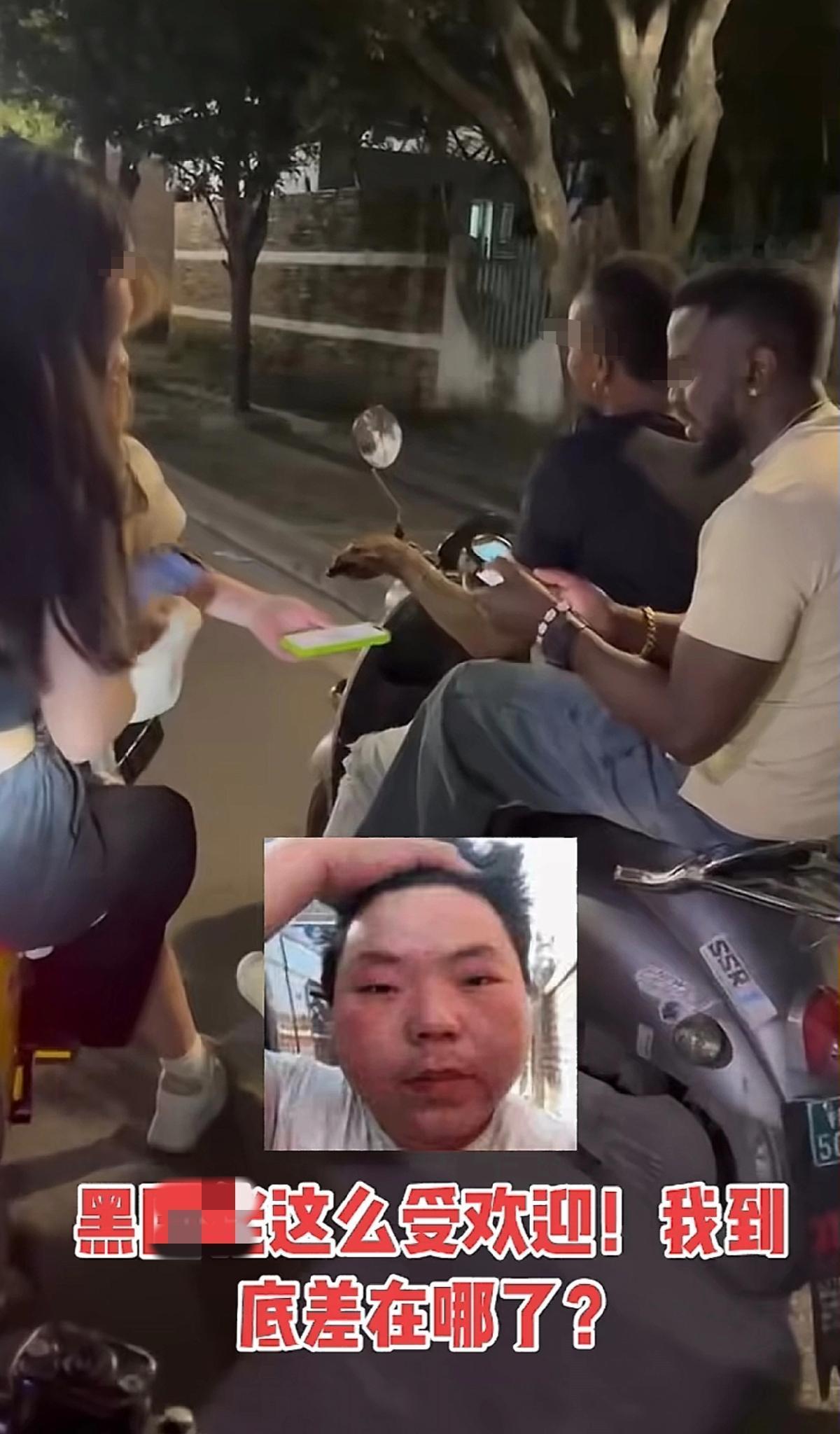 没想到,黑人小哥在国内这么受欢迎。不知道是在哪个省份。两个黑人小哥骑着电驴,路上