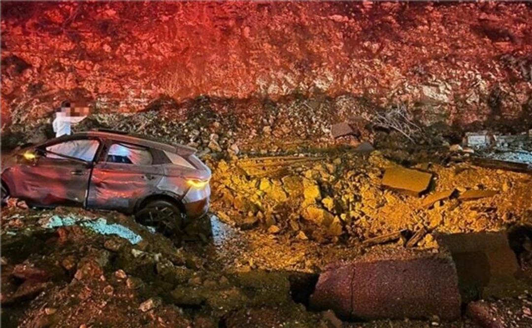 这辆比亚迪，在以色列硬生生扛了一发导弹。车门还能打开，双闪还在跳，三个人，活