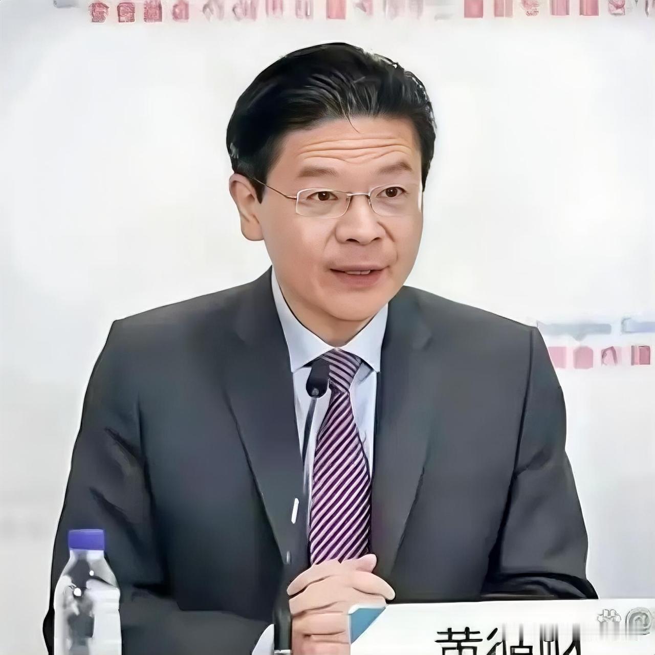 新加坡总理黄循财坐在加拿大电视台的聚光灯下，神情急切，语速紧凑，像急于递交一份“