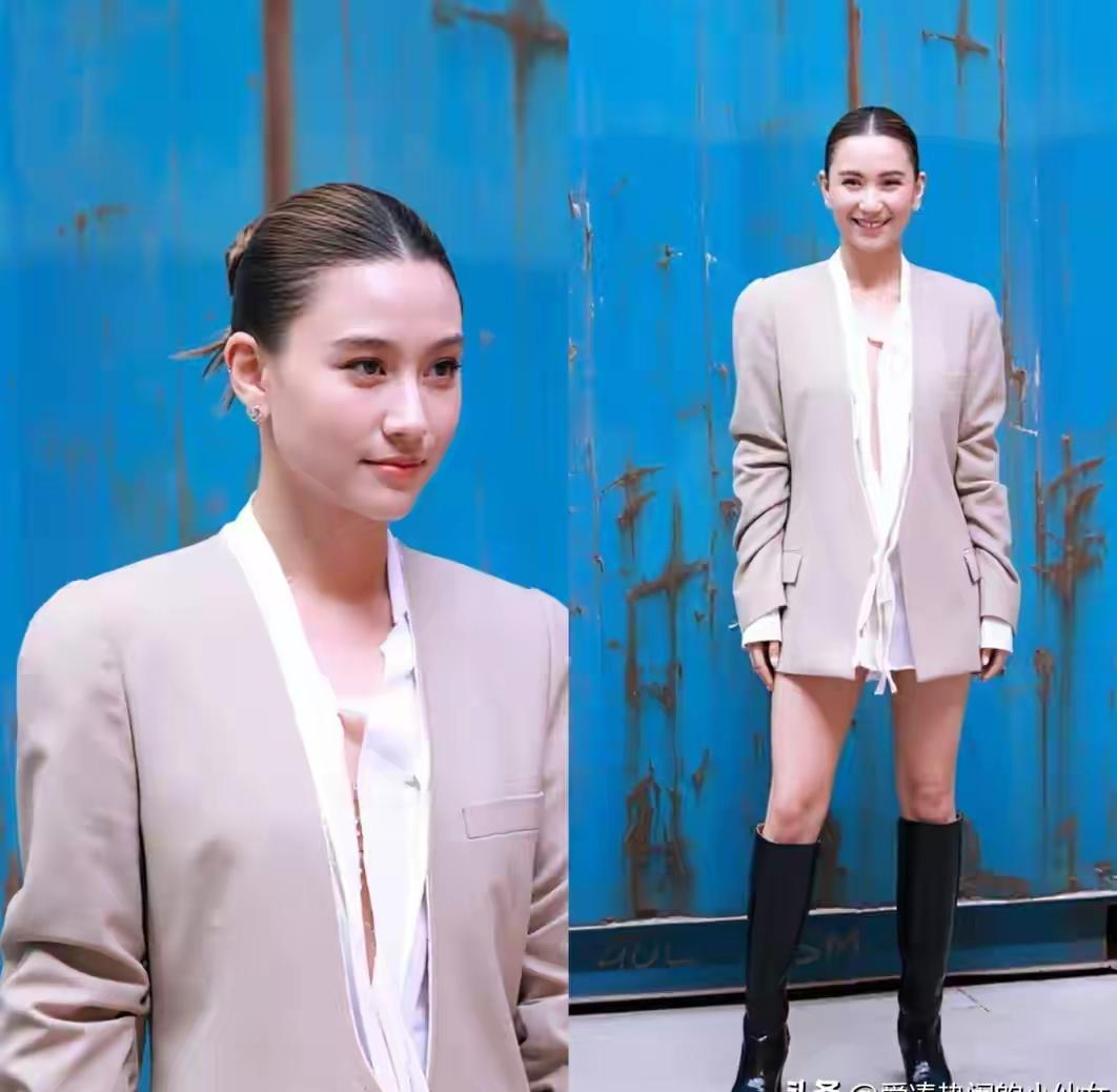 窦骁也管不了！不仔细看没看出来，何超莲的衣服是深V？衬衫压根没系，一道缝延伸到