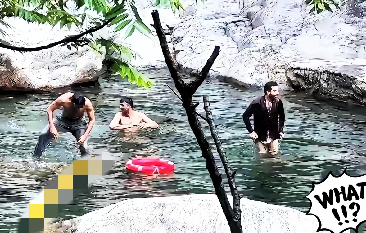 庐山瀑布下那几个印度人在池子里泡澡的样子真是看得人窝火旁边就立着“禁止下水