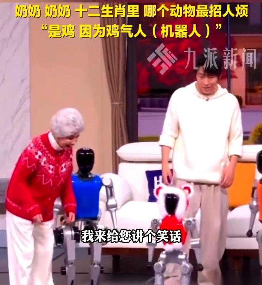 蔡明时隔30年，又穿上了那身机器人的外壳。但这次，对面站着的，是个小机器人，电