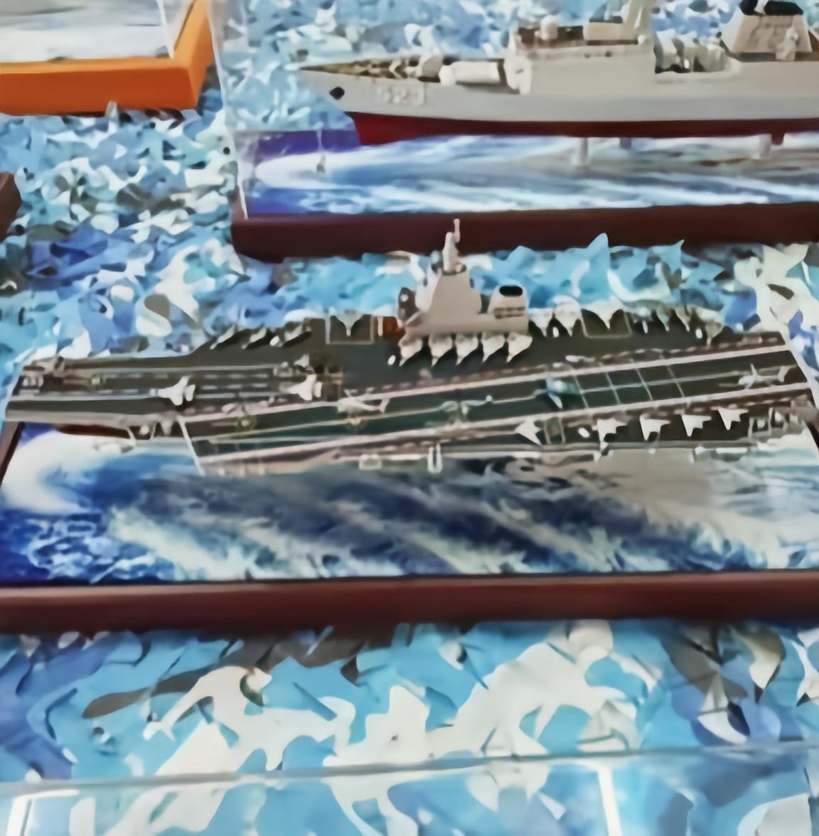 这就解释得通南北同时开建的内涵了：①南边是003G型，改进了舰岛与烟道的矛盾，避