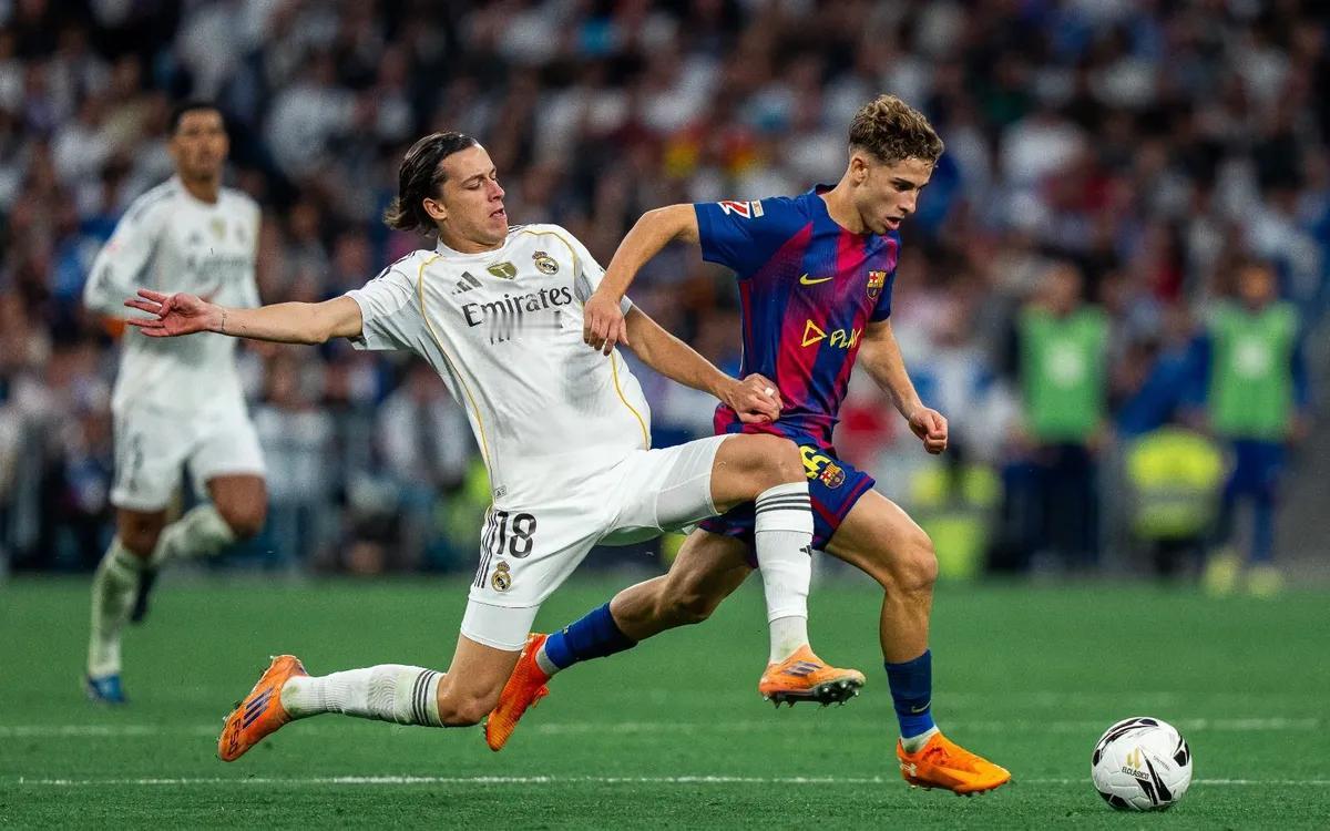 在周日的西班牙国家德比中，皇家马德里在伯纳乌球场以2-1战胜了巴塞罗那，基利安·