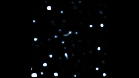 二十年在银河系幽暗的核心。在我们星系的中心，恒星围绕着一个看不见的物质团旋转，就