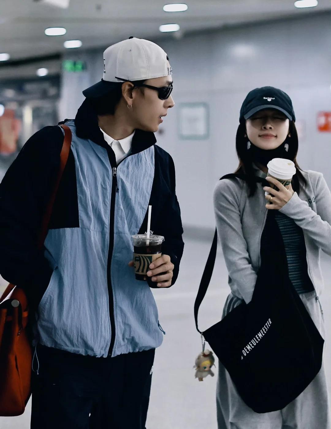 吴谨言洪尧罕见合体现身机场夫妻恩爱✨吴谨言与丈夫洪尧于2026年2月8日清晨