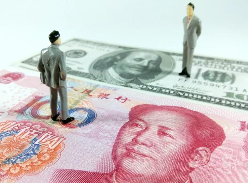 换1万美元，多掏37元！人民币中间价和卖出价这道算术题，90%的人没算明白 