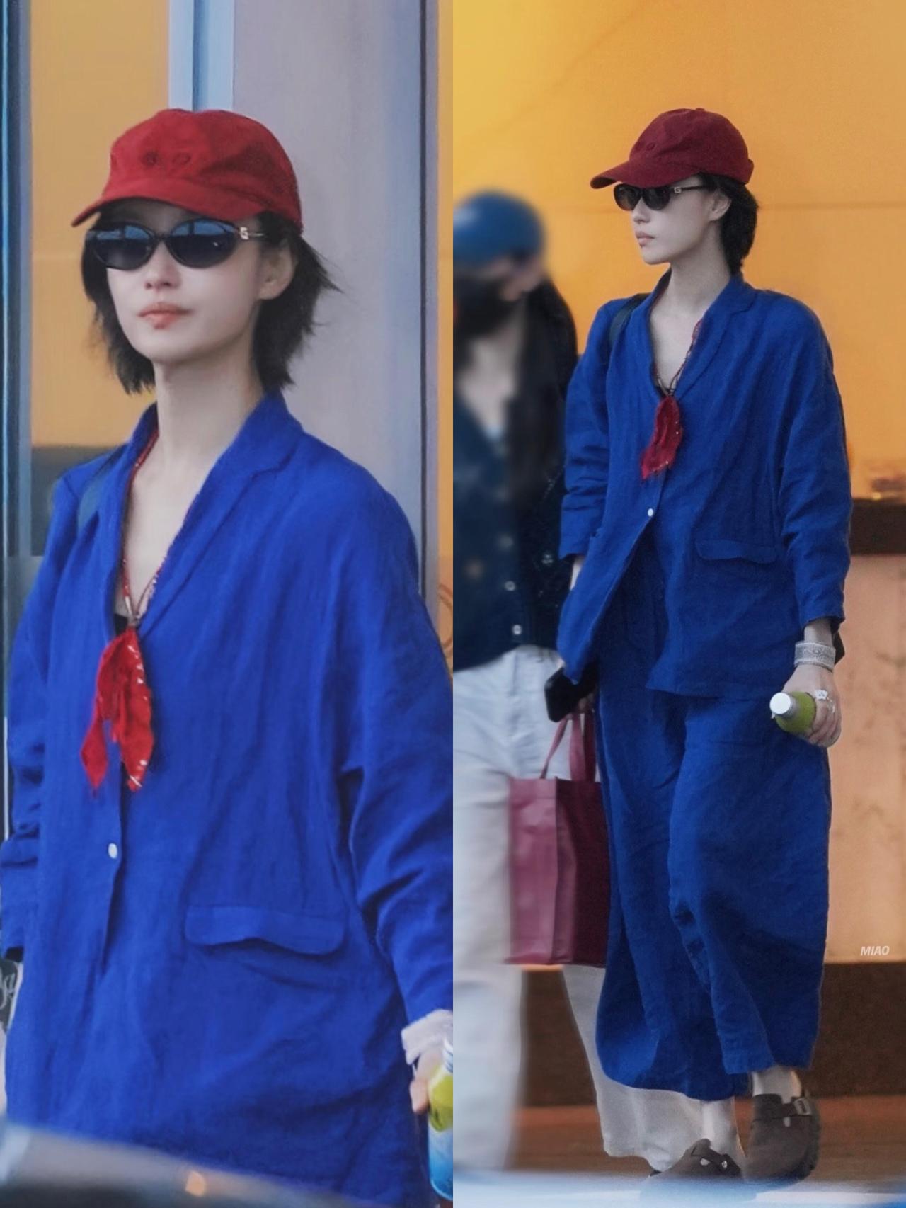倪妮街拍，这次配色很大胆时髦，一般人很难驾驭！克莱因蓝亚麻套装随性又吸睛，宽松