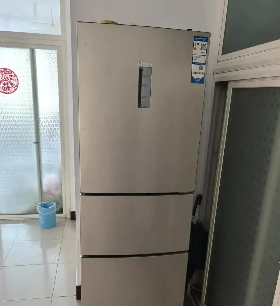 海尔冰箱刚过3年压缩机就罢工，维修报价近一千，发帖人把1998年的老扬子冰箱照片