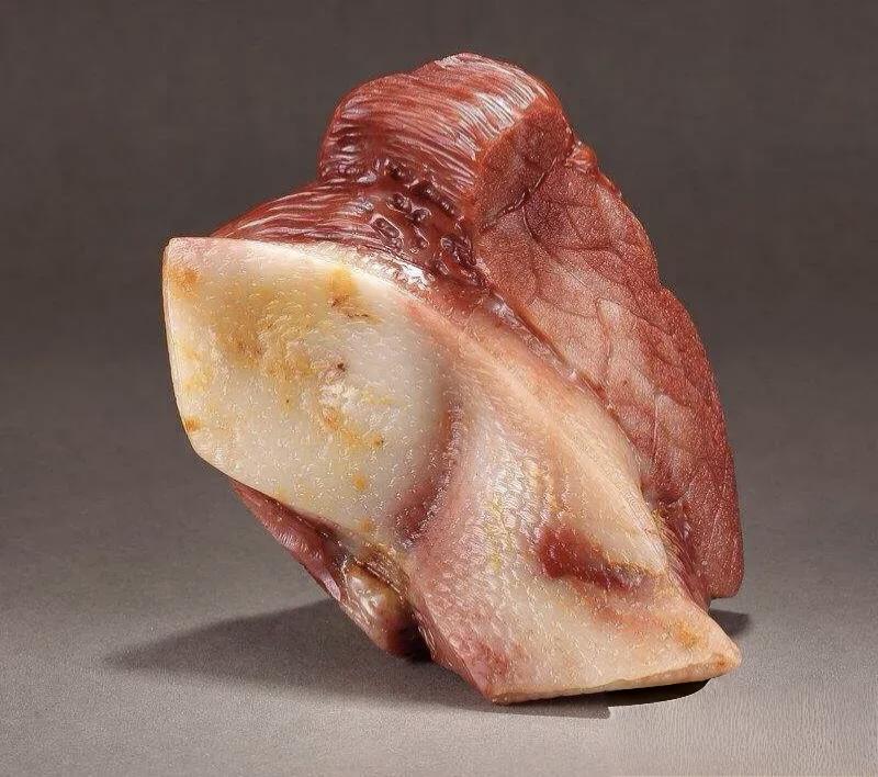 分享你的随手拍据说台湾的故宫博物院里有一块“肉石”，是镇馆之宝，价值连城！说明肉