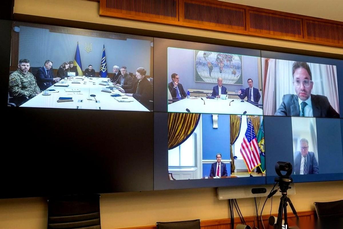 仗还没打完呢，分蛋糕的局已经开好了。而且你看这牌桌上坐的都是谁——泽连斯基那边