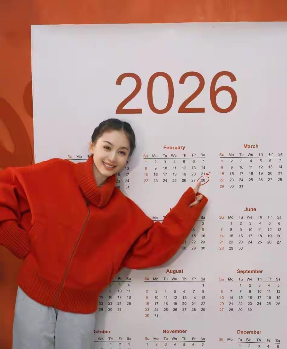 王子文昨天发的生日照,39岁的人看起来跟19岁一样！一袭亮红色外套，捧着白色