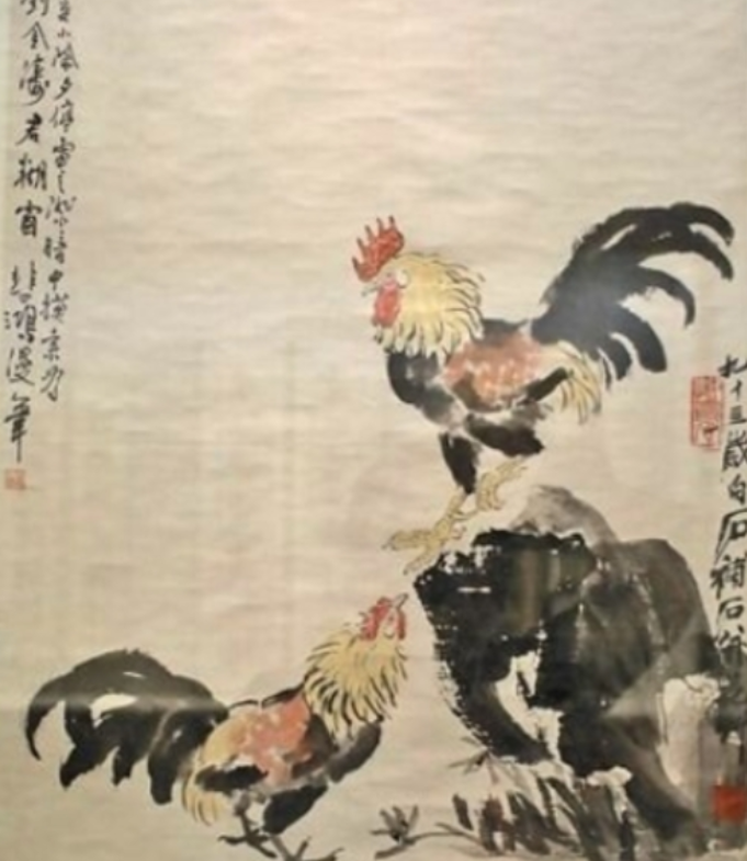 1947年除夕，徐悲鸿为挚友刘金涛作画，刚画完两只公鸡，突然停电了。一时间没办法