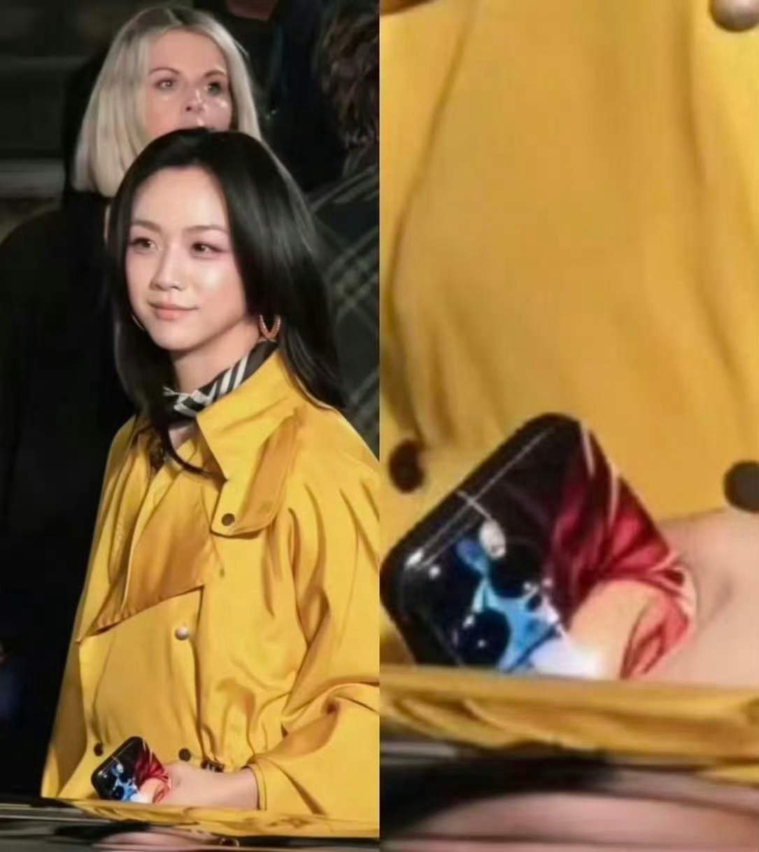 汤唯使用的手机壳因印有国产动画电影《哪吒之魔童降世》中哪吒与敖丙的"藕饼"组合图