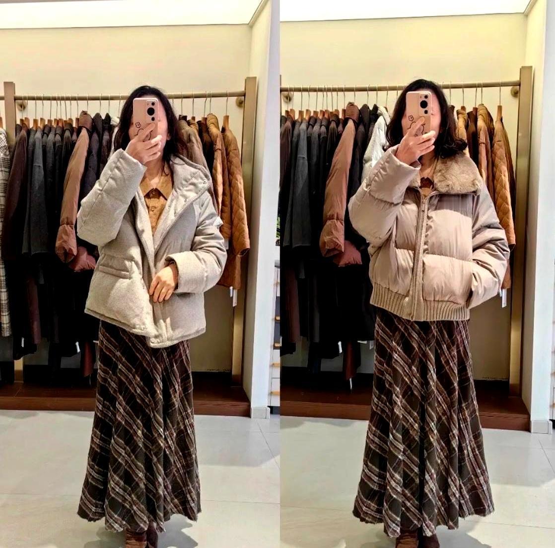 商场里，一位50岁大姐为两件羽绒服站了半小时，我走近一听，愣住了。她喃喃自