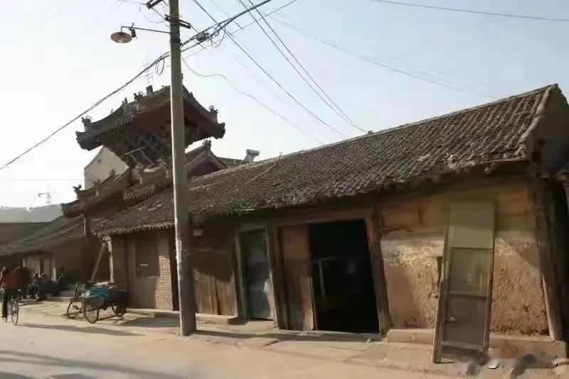 陇西北关：时光褶皱里的烟火长卷一站在新修复的陇西北关正街街口，青石板路